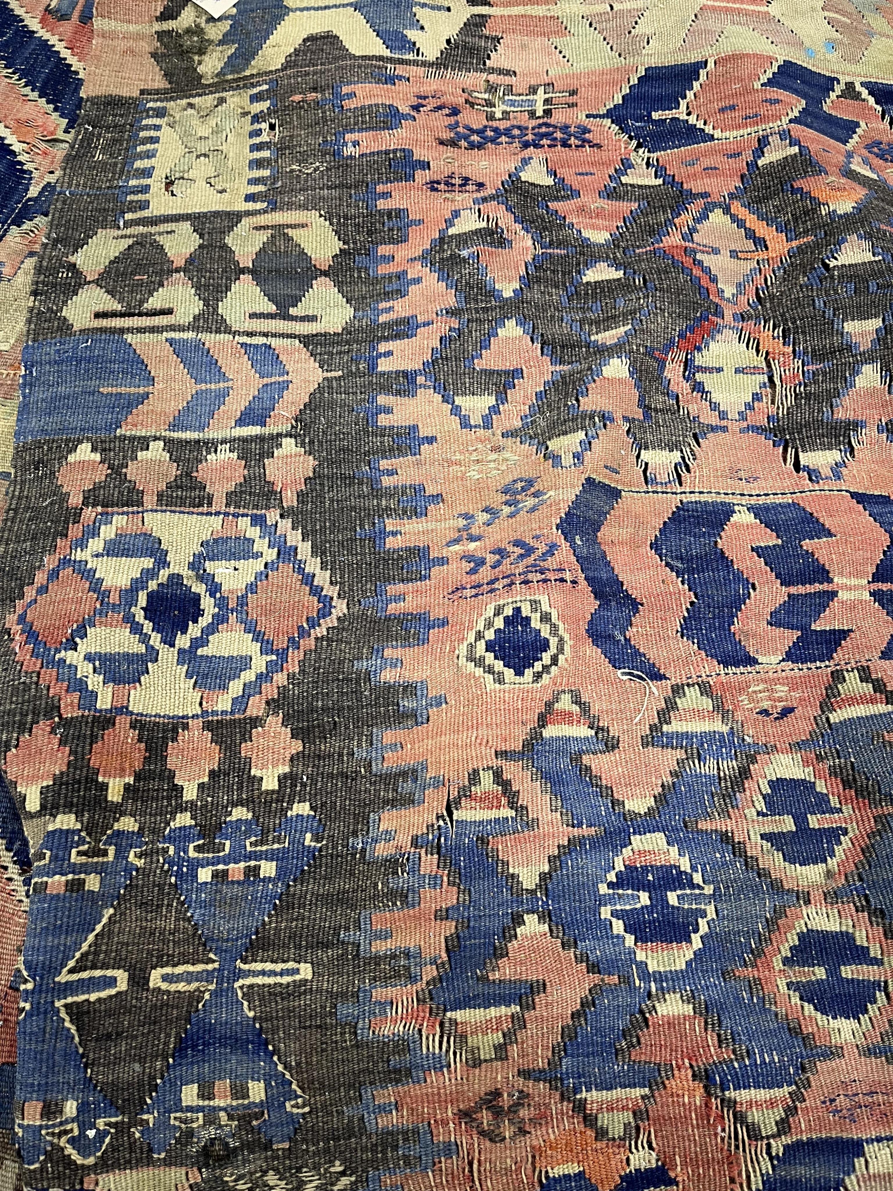 A Kilim polychrome flatweave carpet, 298 x 199cm
